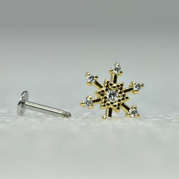 Labret motif flocon de neige doré