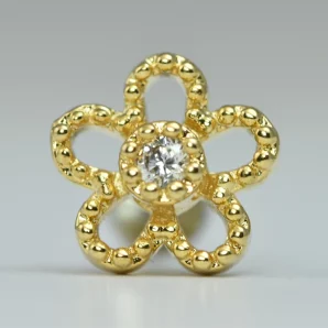 Piercing labret en forme de fleur dorée avec strass en acier pour oreille